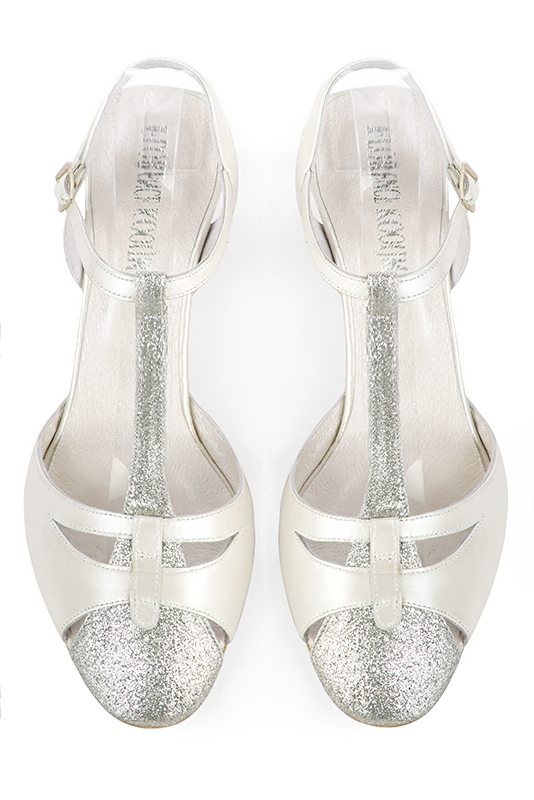 Light silver and pure white women's open back T-strap shoes. Round toe. Medium comma heels. Top view - Florence KOOIJMAN